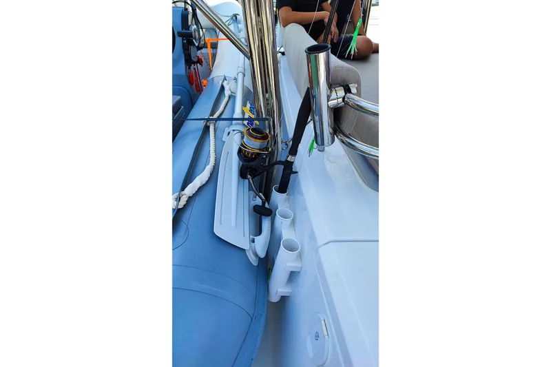  Yacht Photos Pics 2023 Bali 4.2 boat deck with fishing rod holder and equipment.