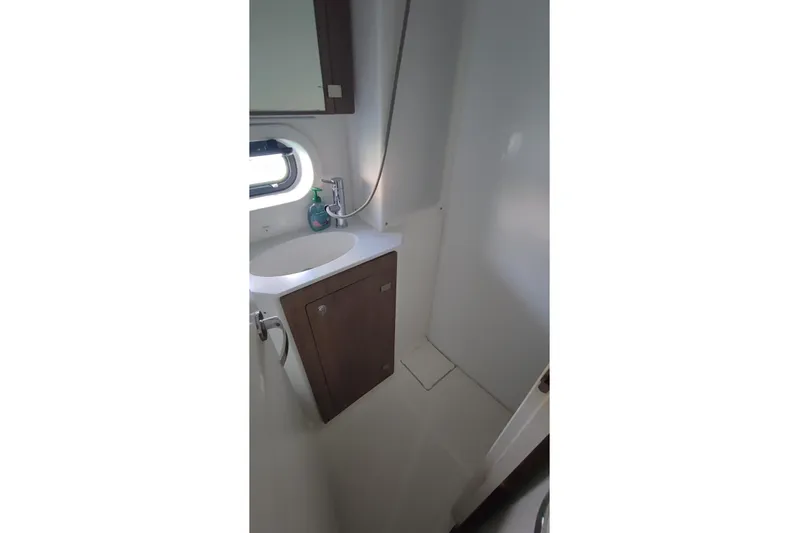  Yacht Photos Pics Modern bathroom in 2023 Bali 4.2 yacht with sink and mirror.