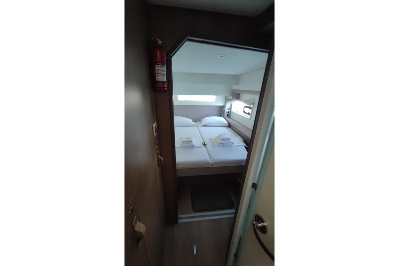  Yacht Photos Pics Cozy cabin interior of 2023 Bali 4.2 yacht with neatly arranged bed.
