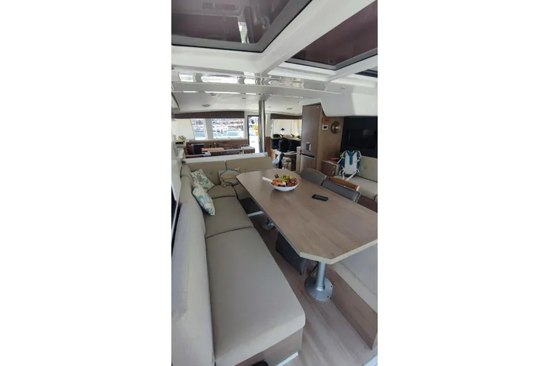  Yacht Photos Pics Luxurious interior of 2023 Bali 4.2 yacht with spacious seating and dining area.