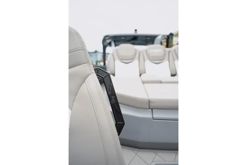  Yacht Photos Pics Luxury seating on 2026 Deep Impact 499 Sport boat, featuring sleek design and comfort.