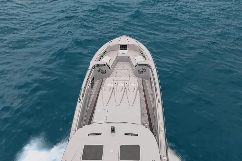  Yacht Photos Pics Top view of 2026 Deep Impact 499 Sport boat cruising on open water.