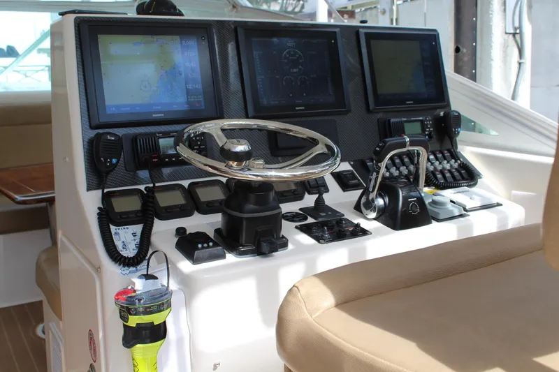 Maripal Yacht Photos Pics 2008 Contender 38 Express helm with advanced navigation and control systems.