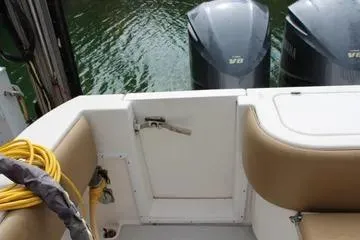 Maripal Yacht Photos Pics 2008 Contender 38 Express boat with twin outboard engines and beige seating.