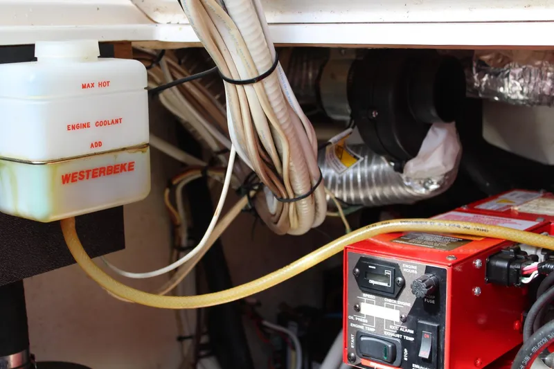 Maripal Yacht Photos Pics Engine compartment of 2008 Contender 38 Express with Westerbeke coolant system.