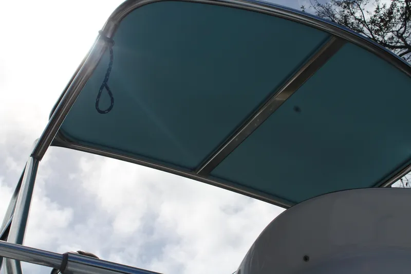 Maripal Yacht Photos Pics 2008 Contender 38 Express boat canopy against a cloudy sky.