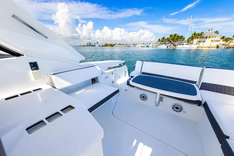  Yacht Photos Pics Monterey 378 Super Express 2017 on calm waters with blue sky.