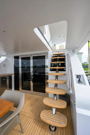 Indigo Yacht Photos Pics Luxurious 2018 Coastal Craft Concord 65 yacht interior with modern staircase and elegant design.