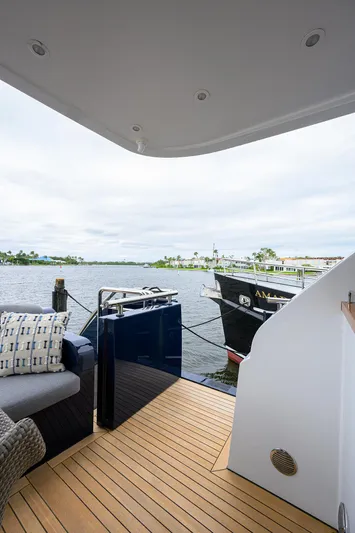 Indigo Yacht Photos Pics Coastal Craft Concord 65 yacht deck with waterfront view, 2018 model.
