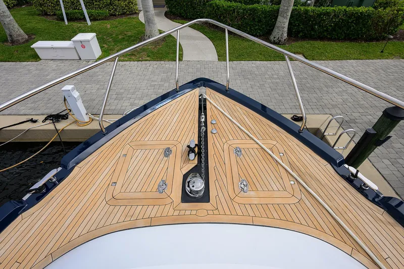 Indigo Yacht Photos Pics Bow view of 2018 Coastal Craft Concord 65 yacht with teak decking.