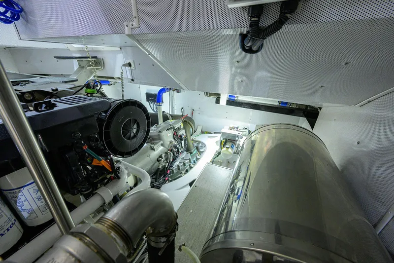 Indigo Yacht Photos Pics Engine room of 2018 Coastal Craft Concord 65 yacht, showcasing mechanical components and systems.