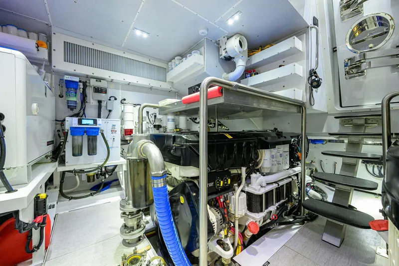 Indigo Yacht Photos Pics Engine room of 2018 Coastal Craft Concord 65 yacht, showcasing advanced machinery and equipment.