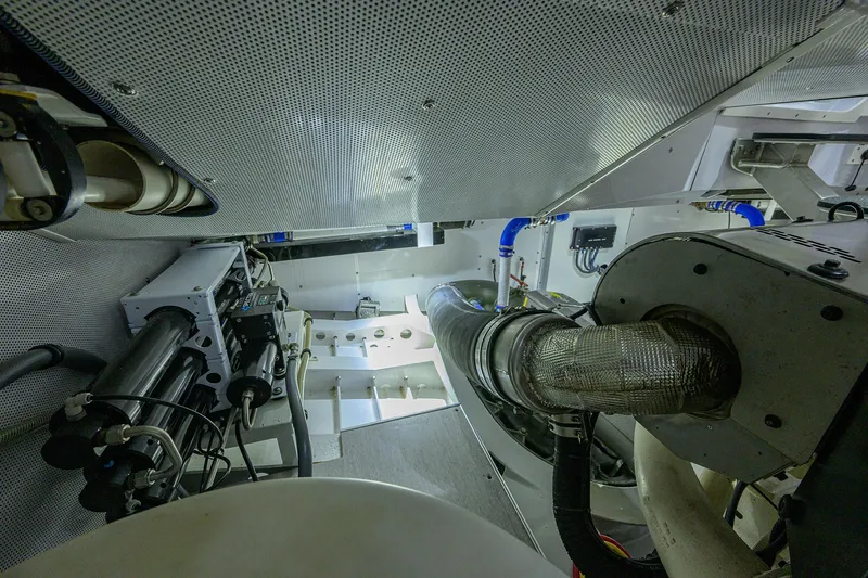 Indigo Yacht Photos Pics Engine room of 2018 Coastal Craft Concord 65 yacht, showcasing mechanical components.