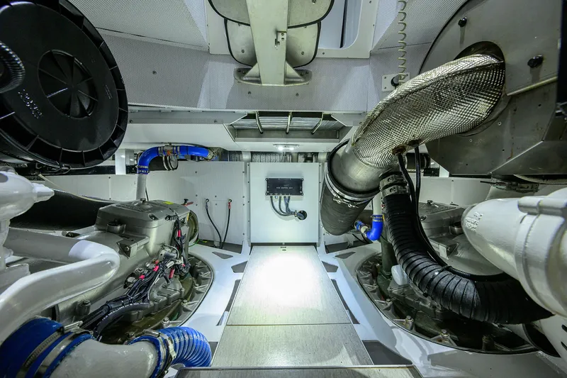Indigo Yacht Photos Pics Engine room of 2018 Coastal Craft Concord 65 yacht, showcasing advanced machinery and components.