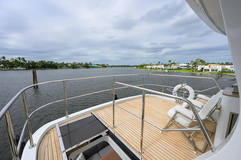 Indigo Yacht Photos Pics Coastal Craft Concord 65 yacht deck with scenic waterfront view, 2018 model.