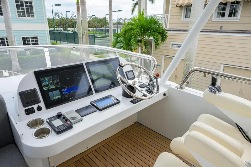 Indigo Yacht Photos Pics Helm of 2018 Coastal Craft Concord 65 yacht with modern navigation equipment.