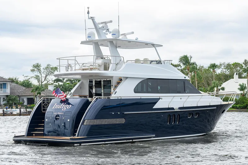 Indigo Yacht Photos Pics 2018 Coastal Craft Concord 65 yacht on water, sleek design, luxury vessel.