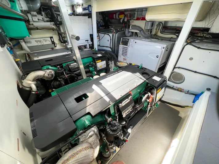  Yacht Photos Pics Engine room of a 2020 Prestige 520S yacht, featuring dual engines and mechanical systems.