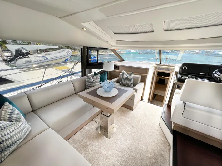  Yacht Photos Pics Luxurious interior of 2020 Prestige 520S yacht with elegant seating and scenic views.