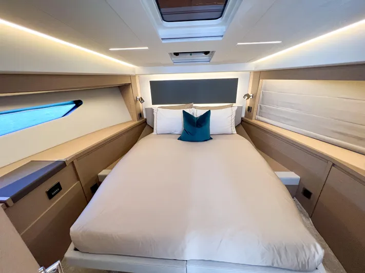  Yacht Photos Pics Luxurious cabin interior of 2020 Prestige 520S yacht with modern design and cozy bedding.