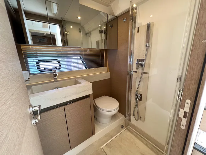  Yacht Photos Pics Modern bathroom in 2020 Prestige 520S yacht with shower, sink, and toilet.