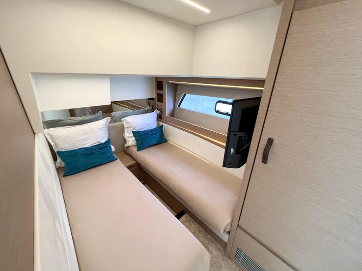  Yacht Photos Pics Luxurious cabin interior of 2020 Prestige 520S yacht with twin beds and modern decor.