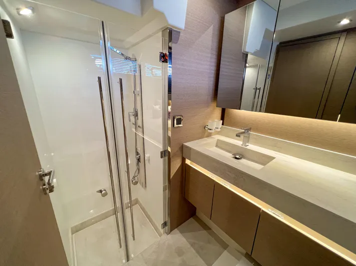  Yacht Photos Pics Modern bathroom in 2020 Prestige 520S yacht with sleek shower and elegant vanity.