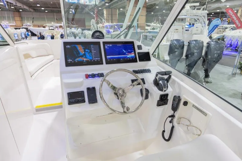 2026 27' Albemarle Dual Console Yacht Photos Pics 2026 Albemarle 27 Dual Console boat interior with modern navigation equipment and controls.