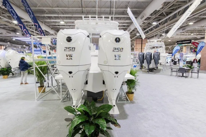 2026 27' Albemarle Dual Console Yacht Photos Pics 2026 Albemarle 27 Dual Console boat with twin 250 V6 engines at indoor exhibition.