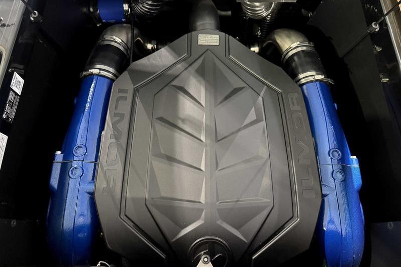 2026 MasterCraft NXT22 engine with Ilmor branding, featuring blue components and sleek design.