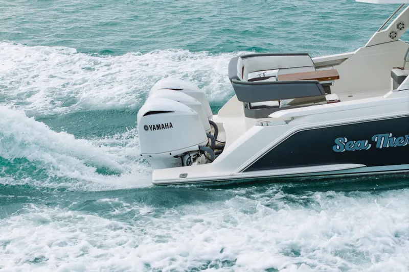  Yacht Photos Pics 2020 Tiara Sport 38 LS boat with Yamaha engines cruising on water.