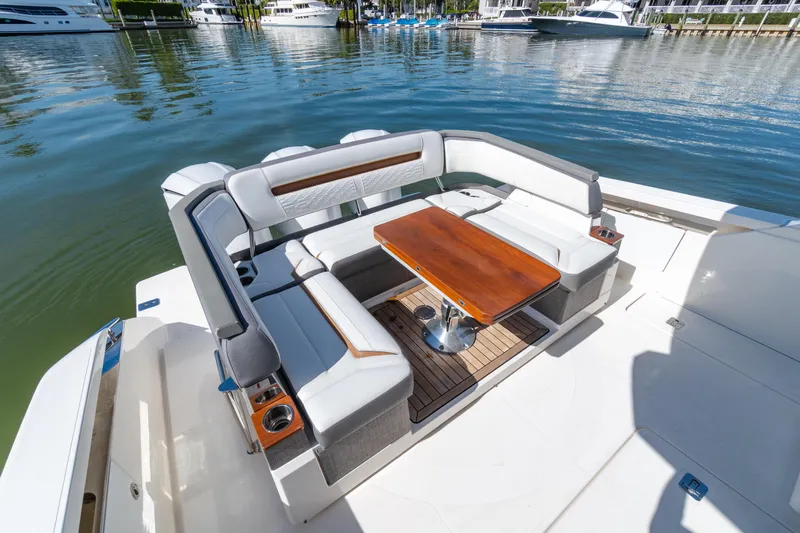  Yacht Photos Pics Luxurious seating area on 2020 Tiara Sport 38 LS boat, docked at marina.