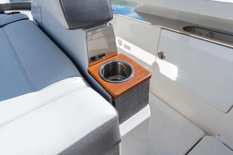  Yacht Photos Pics 2020 Tiara Sport 38 LS boat interior with cup holder and seating detail.