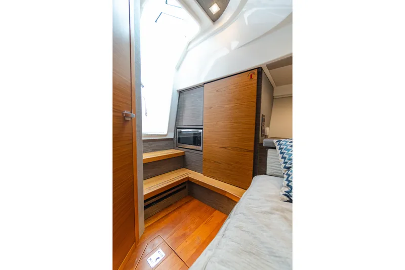 Yacht Photos Pics 2020 Tiara Sport 38 LS interior with wood finishes and modern design.
