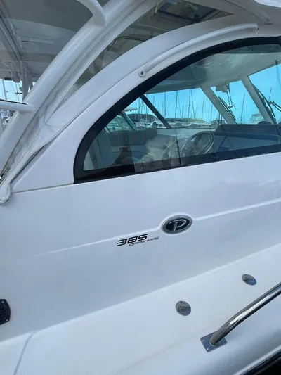 No Name Yacht Photos Pics 2019 Pursuit OS 385 Offshore boat, sleek design, docked at marina.