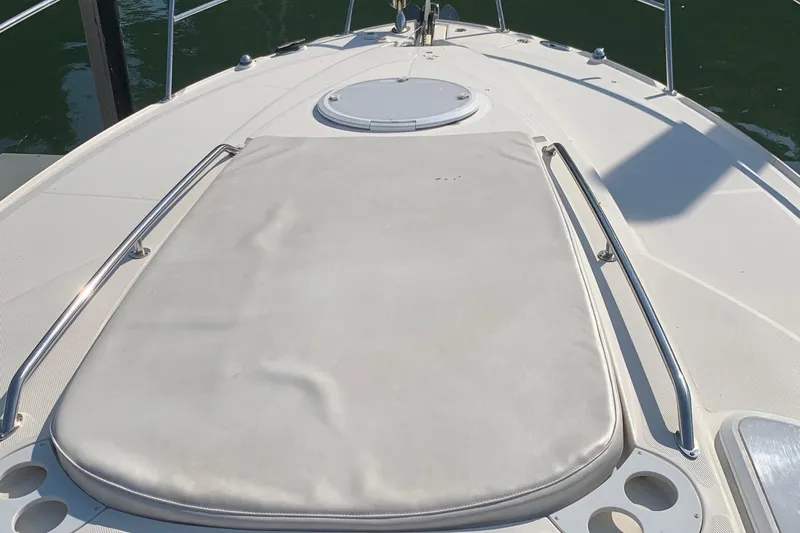  Yacht Photos Pics 2009 Monterey 340 Sport Yacht bow with sunpad and hatch.