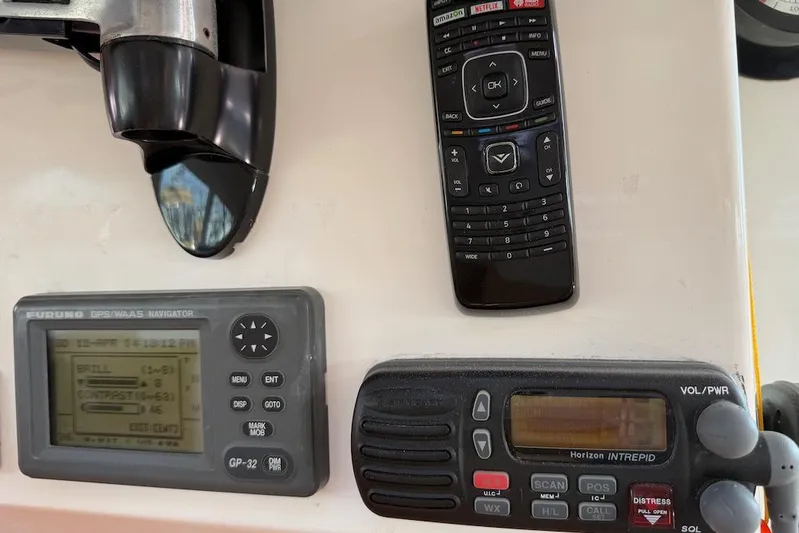 Zimbini Yacht Photos Pics Control panel of a 2006 Island Spirit 401 with GPS, remote, and radio equipment.