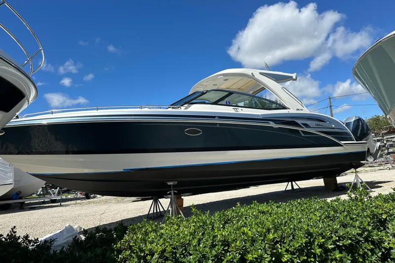  Yacht Photos Pics 2021 Formula 350 Crossover Bowrider OB on display under a clear blue sky.