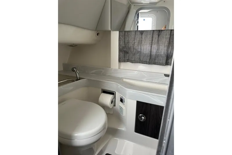  Yacht Photos Pics 2021 Formula 350 Crossover Bowrider OB bathroom interior with modern fixtures and compact design.