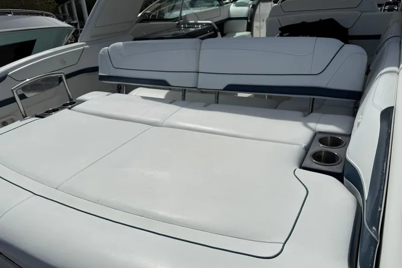  Yacht Photos Pics 2021 Formula 350 Crossover Bowrider OB with spacious white seating and cup holders.