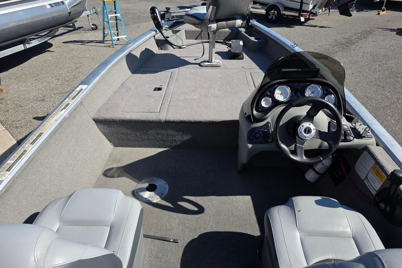 2010 Bass Tracker Pro Crappie 175 boat interior with steering console and seating.