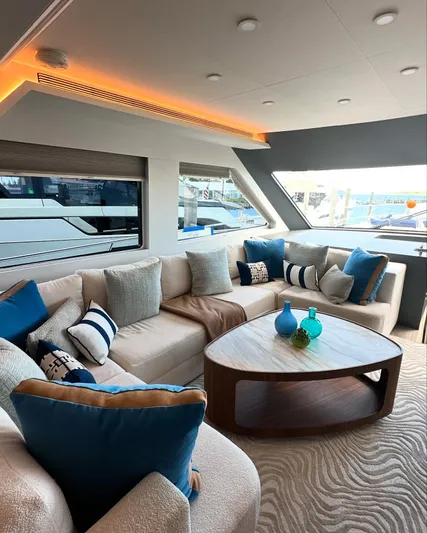  Yacht Photos Pics Luxurious interior of 2023 CL Yachts CLB65 with elegant seating and modern decor.
