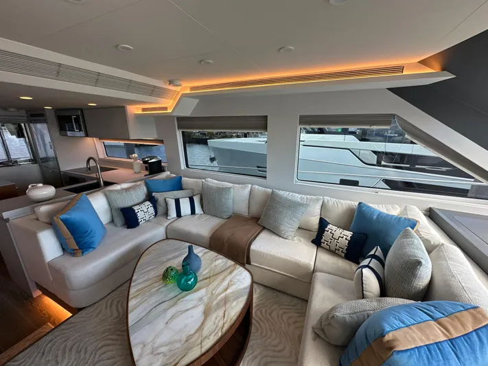  Yacht Photos Pics Luxurious interior of 2023 CL Yachts CLB65 with elegant seating and modern decor.