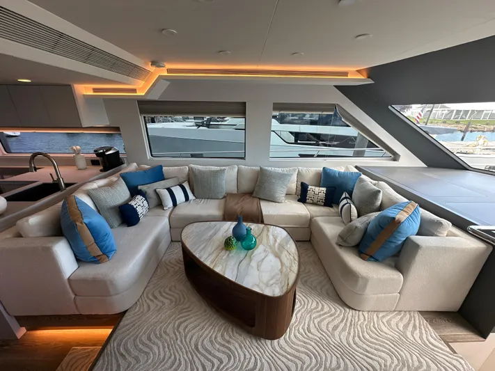  Yacht Photos Pics Luxurious interior of 2023 CL Yachts CLB65 with elegant seating and modern decor.