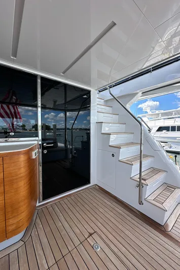  Yacht Photos Pics 2023 CL Yachts CLB65 yacht deck with stairs and sleek design.