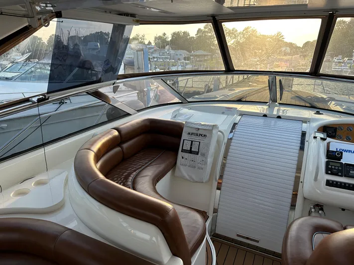  Yacht Photos Pics Luxurious 1997 Sunseeker Camargue yacht interior with leather seating and control panel.