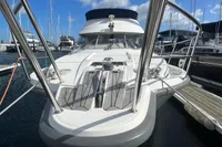 Nimbus 380 Carisma 1999 yacht docked at marina, showcasing sleek design and modern features.
