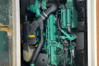 Engine compartment of a 1999 Nimbus 380 Carisma boat, showcasing detailed mechanical components.