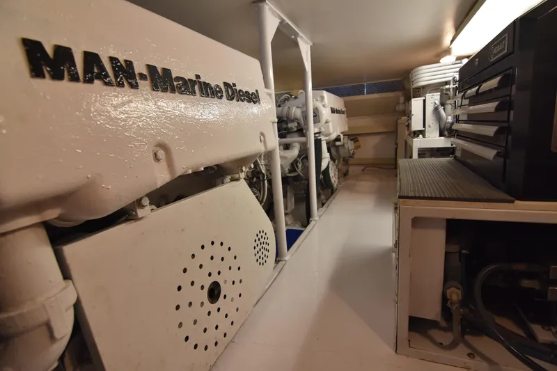 Legacy Yacht Photos Pics Engine room of 1999 Viking 58 Convertible with MAN Marine Diesel engines.