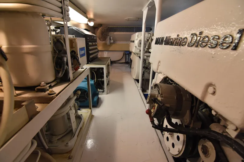 Legacy Yacht Photos Pics Engine room of 1999 Viking 58 Convertible yacht with marine diesel engines.